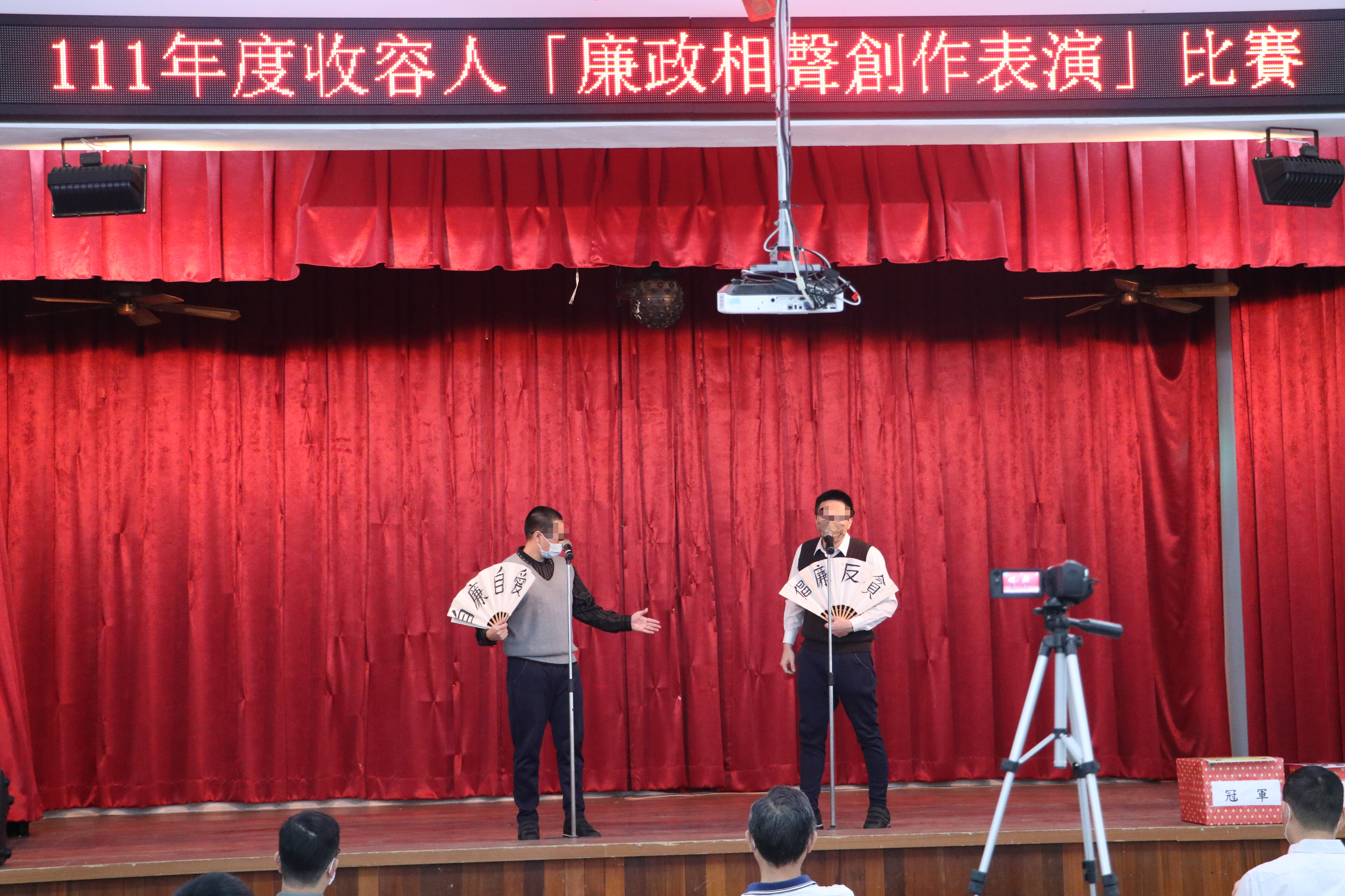 The inmates performed on stage